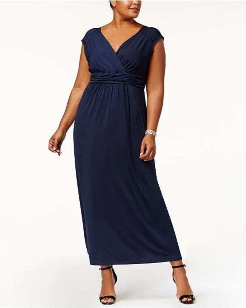 Front of a model wearing a size 1X NY Collection Plus Size Ruched Empire Maxi Dress Navy Size 1X in Blue by NY Collection. | dia_product_style_image_id:313443